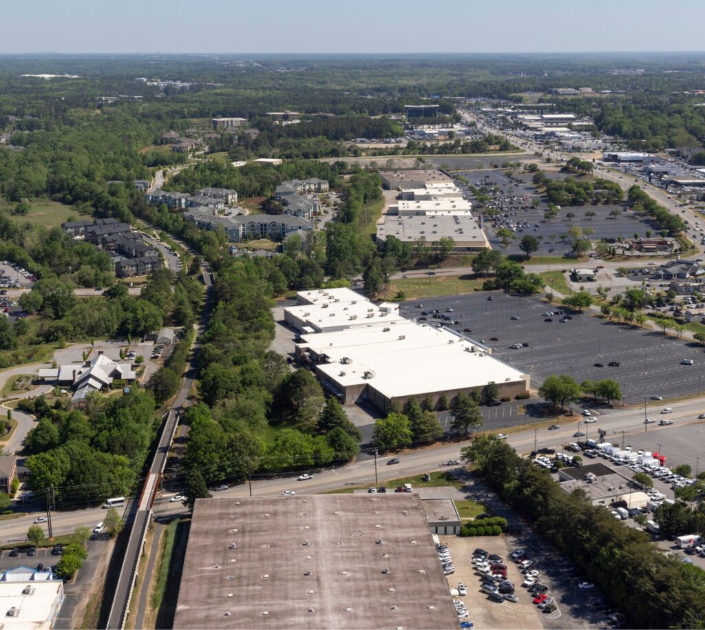 A bird's eye view of the current retail buildings in the area of where the future Bolden Street District will be in Greenville, South Carolina.